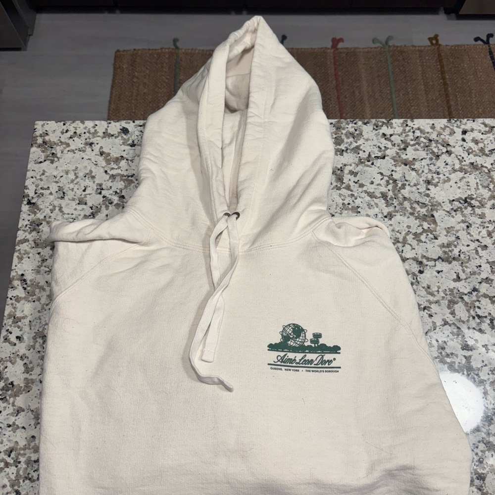 Aime Leon Dore Cream Hoodie with Green Logo